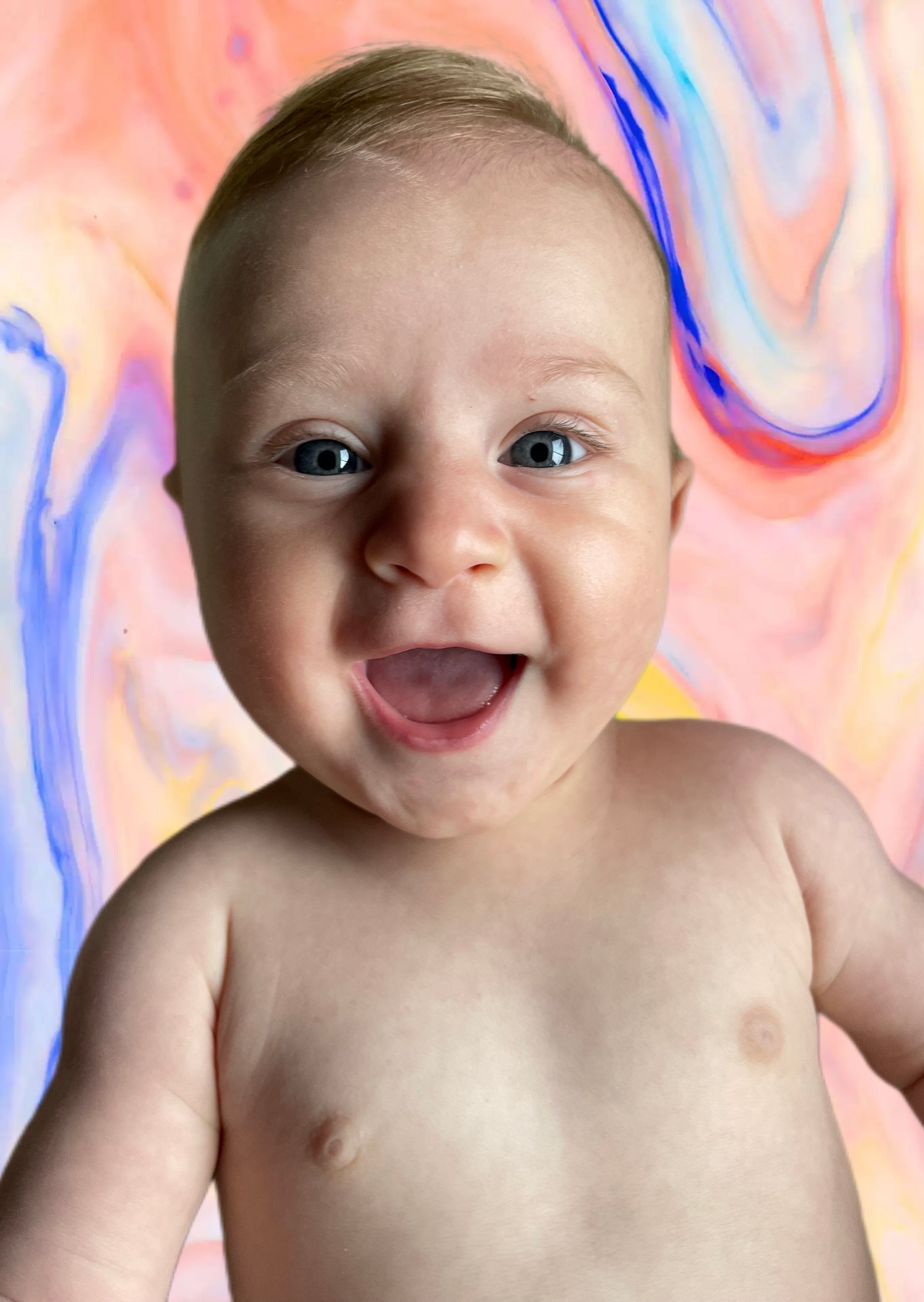 Happy baby smiling - pediatric physiotherapy patient at Kinetic Kids